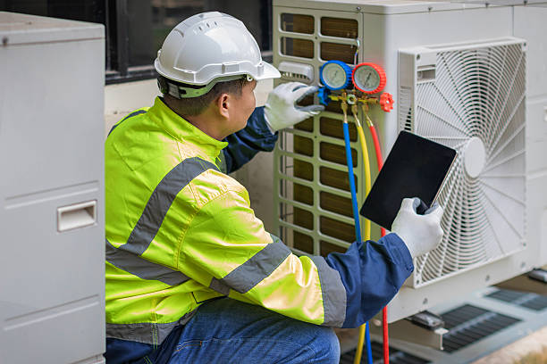 Professional Air Duct Cleaning technician working in Lewiston, ID